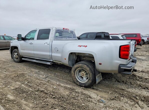 1GC4KXEY5KF154609 2019 CHEVROLET SILVERADO Silver Trasero izquierdo