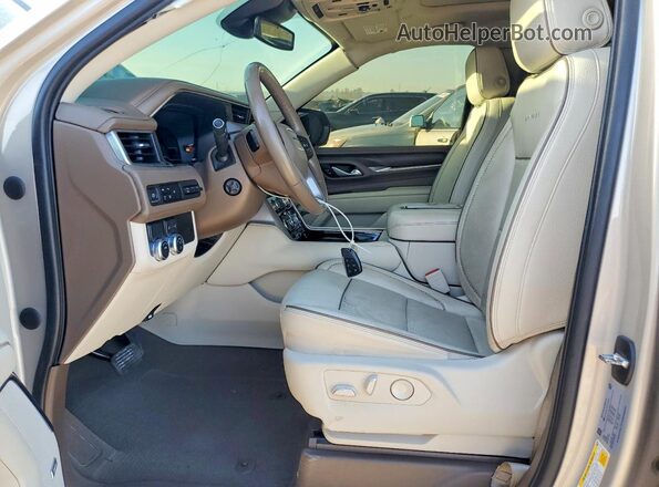 1GKS1JKL2PR154402 2023 GMC YUKON Золотой Вид салона спереди