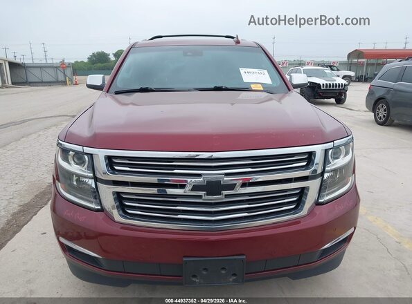 1GNSCCKC5LR105987 2020 CHEVROLET TAHOE Maroon Widok wnętrza z tyłu