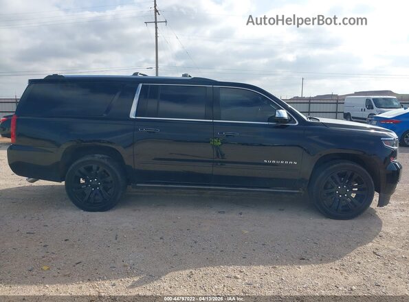 1GNSCJKJ4LR114750 2020 CHEVROLET SUBURBAN Black Vista interior trasera