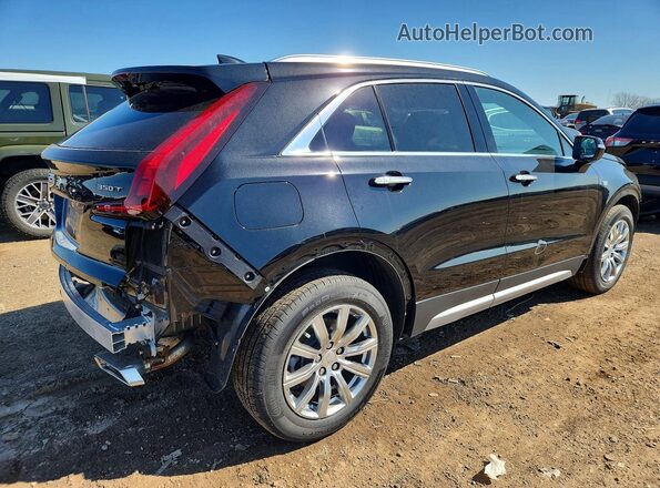 1GYFZDR43NF166508 2022 CADILLAC XT4 Черный Задняя правая четверть