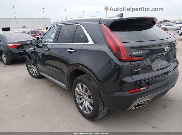 1GYFZDR4XPF199864 2023 CADILLAC XT4 Black Rear left