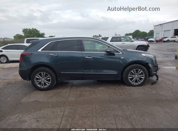1GYKNCR46MZ197317 2021 CADILLAC XT5 Синий Вид задней части салона