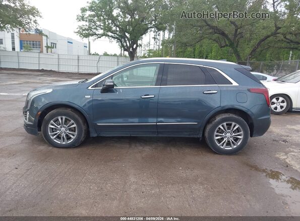 1GYKNCR46MZ197317 2021 CADILLAC XT5 Синий Панорамный вид салона 360°