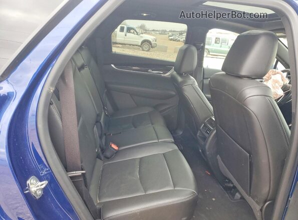 1GYKNDRS4PZ190861 2023 CADILLAC XT5 Blue Rear interior view