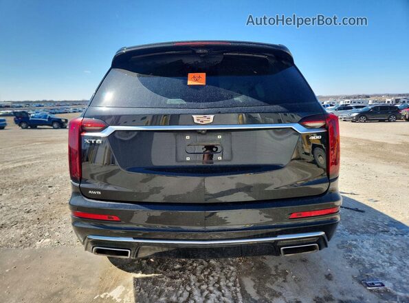 1GYKPDRS3RZ714868 2024 CADILLAC OTHER Black Вид ззаду