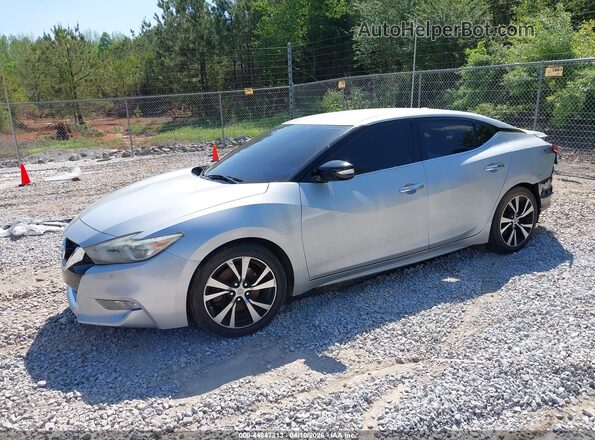 1N4AA6AP9HC446079 2017 NISSAN MAXIMA Серебряный Передняя левая четверть