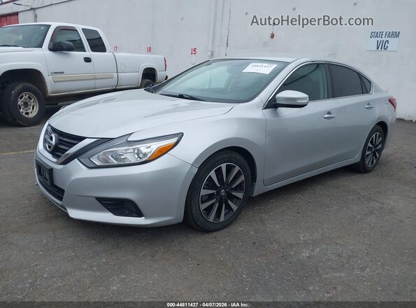 1N4AL3AP5JC243379 2018 NISSAN ALTIMA Silver წინა მარცხენა ხედი სამი მეოთხედიდან