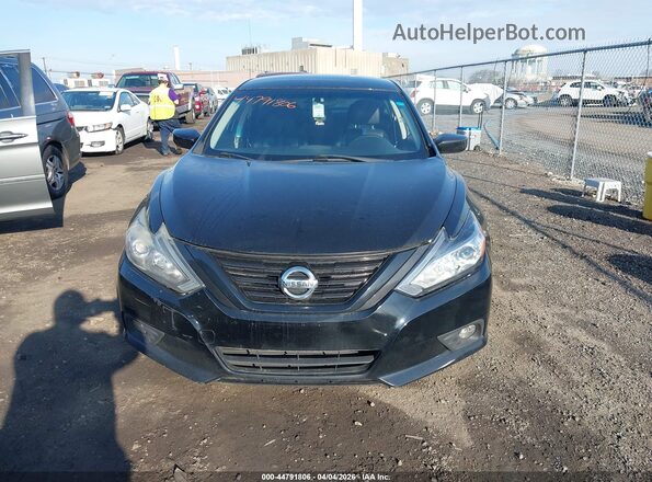 1N4AL3AP8JC257258 2018 NISSAN ALTIMA Black ხელსაწყოთა პანელის ხედი
