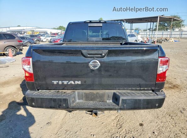 1N6AA1CE2MN511908 2021 NISSAN TITAN Black Rear view