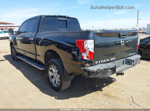 1N6BA1F45KN521983 2019 NISSAN TITAN XD Black Trasero izquierdo