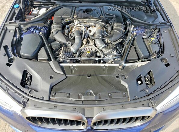 WBAJB9C5XJB286100 2018 BMW M5 Blue Vista del compartimento del motor