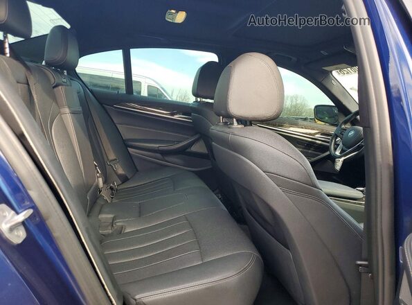 WBAJB9C5XJB286100 2018 BMW M5 Blue Vista interior trasera
