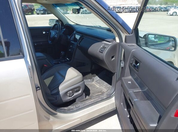 2FMGK5C88HBA09042 2017 FORD FLEX Gold Front interior view