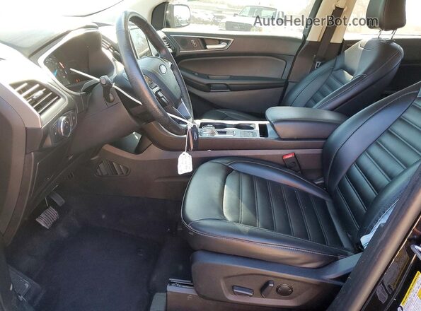 2FMPK3J91MBA21432 2021 FORD EDGE Черный Вид салона спереди