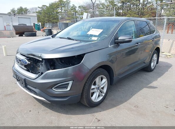 2FMPK4J88JBB69845 2018 FORD EDGE Gray Vista tres cuartos delantera izquierda
