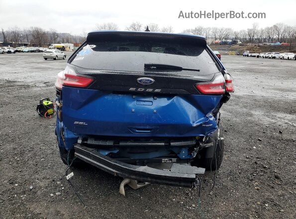 2FMPK4J90RBA48974 2024 FORD EDGE Blue Vista trasera