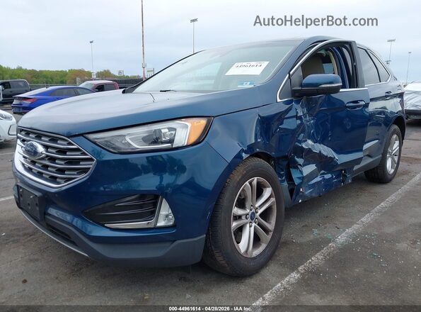 2FMPK4J93LBA38737 2020 FORD EDGE Blue Przód lewy