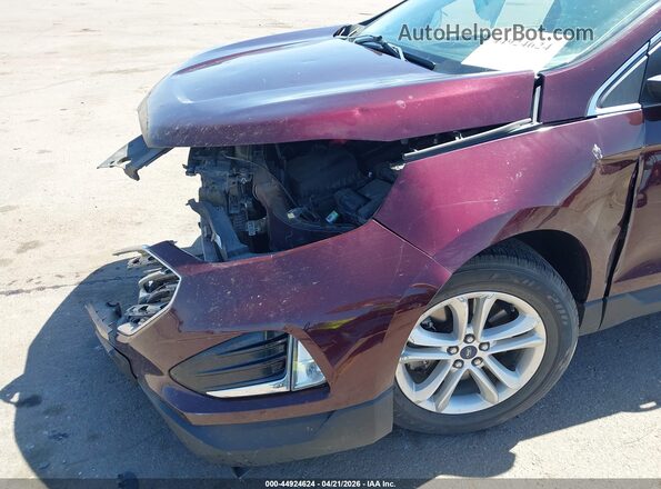 2FMPK4J94KBC24673 2019 FORD EDGE Purple Widok z przodu