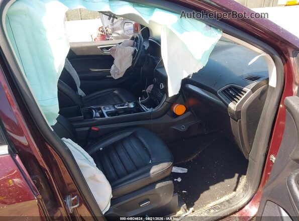 2FMPK4J94KBC24673 2019 FORD EDGE Purple Widok wnętrza z przodu