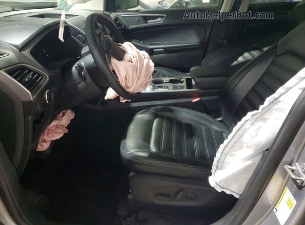 2FMPK4J95RBA78892 2024 FORD EDGE Серебряный Вид салона спереди
