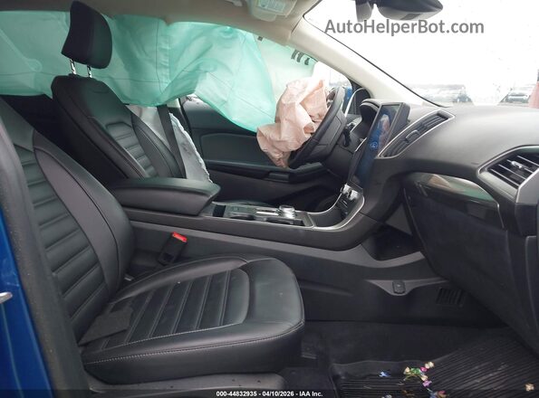 2FMPK4J96RBA26896 2024 FORD EDGE Blue Вид салону спереду
