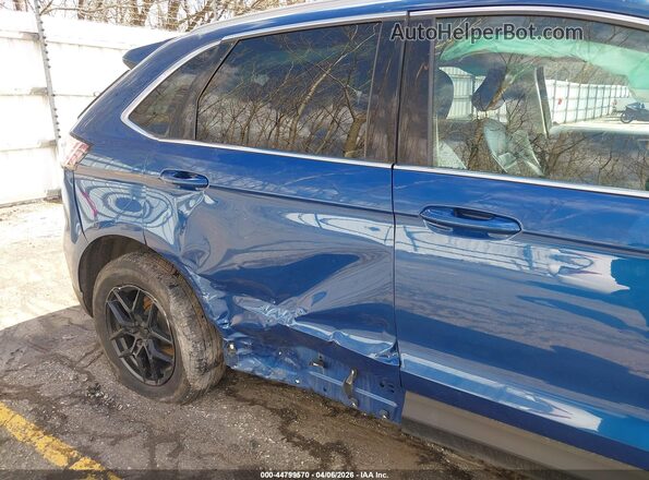 2FMPK4J97LBA44587 2020 FORD EDGE Blue Vista frontal