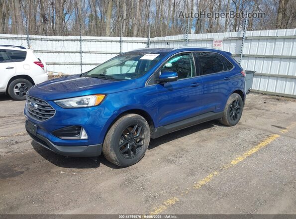 2FMPK4J97LBA44587 2020 FORD EDGE Blue Vista tres cuartos delantera izquierda