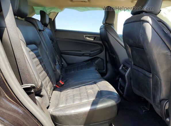 2FMPK4J98PBA20238 2023 FORD EDGE Black Սալոնի հետևի տեսք