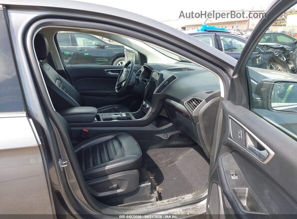 2FMPK4J9XRBA27386 2024 FORD EDGE Gray Vista interior delantera