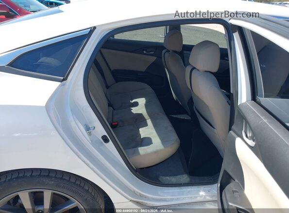 2HGFC1F32MH702574 2021 HONDA CIVIC White Вид наклейки з VIN-кодом