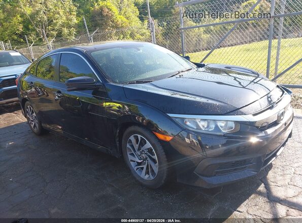 2HGFC2F79JH528488 2018 HONDA CIVIC Black Rear interior view
