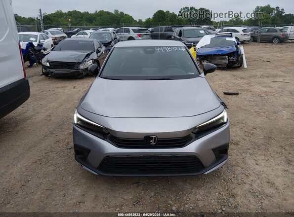 2HGFE2F57RH569111 2024 HONDA CIVIC Silver Սարքավորումների վահանակի տեսք