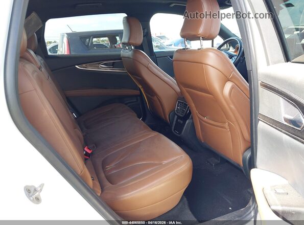 2LMPJ6K91NBL20525 2022 LINCOLN NAUTILUS Beige VIN կոդի պիտակի տեսք