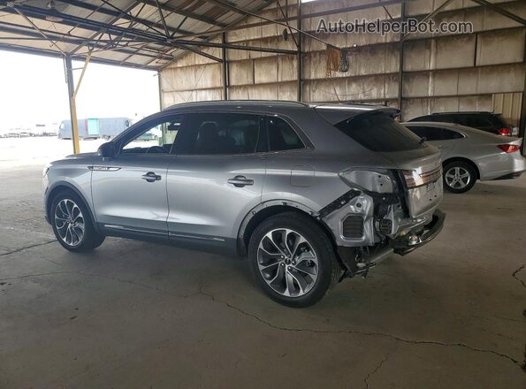 2LMPJ6K93PBL00201 2023 LINCOLN NAUTILUS Silver Trasero izquierdo