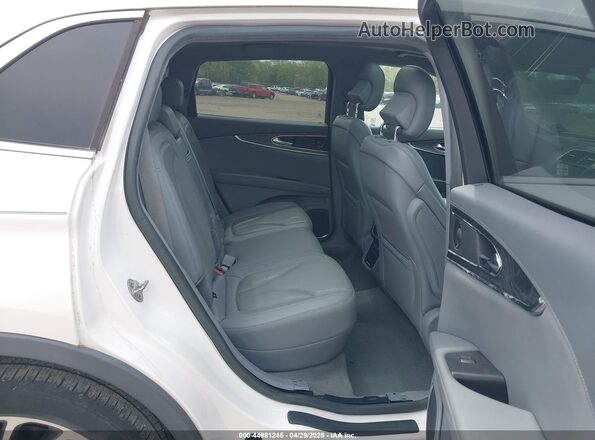 2LMPJ8LP8KBL40453 2019 LINCOLN NAUTILUS White VIN sticker view