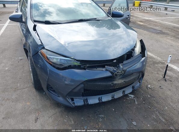 2T1BURHE2HC882176 2017 TOYOTA LL Gray Вид спереду