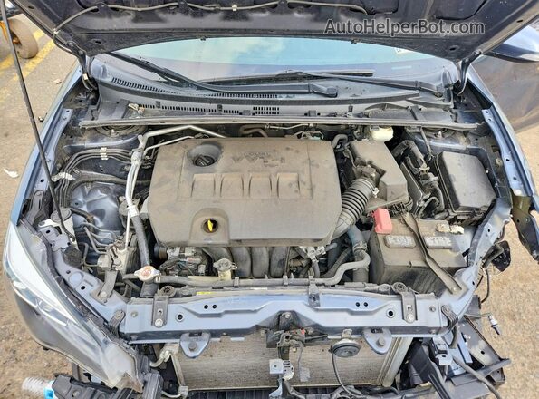 2T1BURHE3JC089779 2018 TOYOTA LL Gray უკანა სალონის ხედი