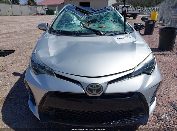 2T1BURHEXJC095823 2018 TOYOTA LL Серебряный Вид задней части салона