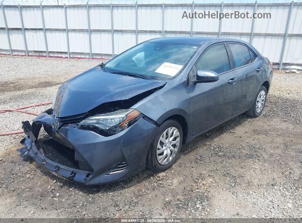 2T1BURHEXKC236486 2019 TOYOTA LL Gray წინა მარცხენა ხედი სამი მეოთხედიდან