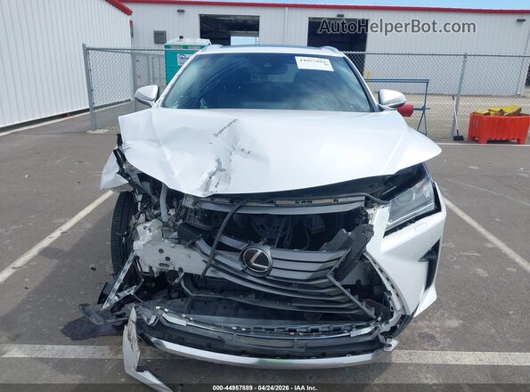 2T2BZMCA4JC147144 2018 LEXUS RX 350 White Rear interior view
