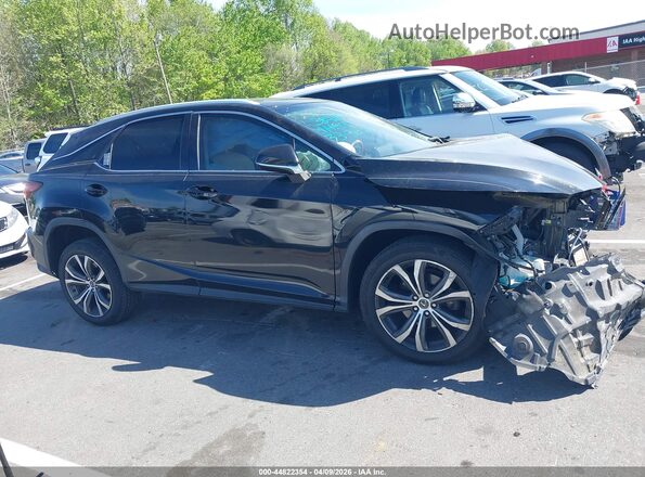 2T2ZZMCA2JC098587 2018 LEXUS RX 350 Черный Вид задней части салона