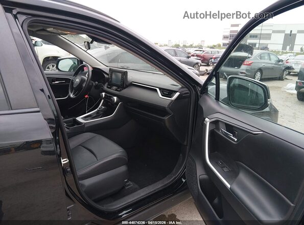 2T3C1RFV1KC027614 2019 TOYOTA LE Black Front interior view