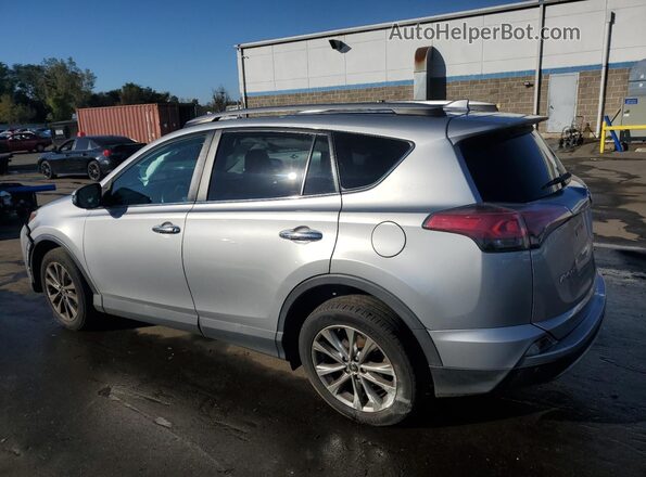 2T3DFREV4HW591465 2017 TOYOTA LIMITED Silver Trasero izquierdo