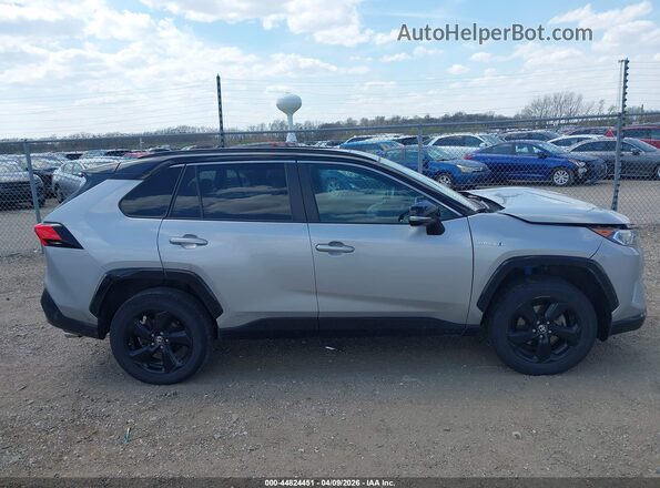 2T3E6RFV4MW027473 2021 TOYOTA RAV4 HYBRID Silver Вид задньої частини салону