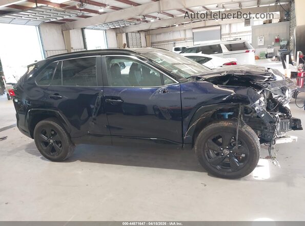 2T3E6RFV9MW006375 2021 TOYOTA RAV4 HYBRID Blue Vista interior trasera