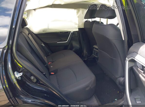 2T3G1RFV3SC559982 2025 TOYOTA LE Black Vista de la etiqueta del VIN