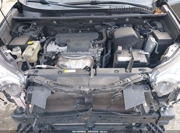 2T3JFREVXGW495552 2016 TOYOTA RAV4 Black Rear view