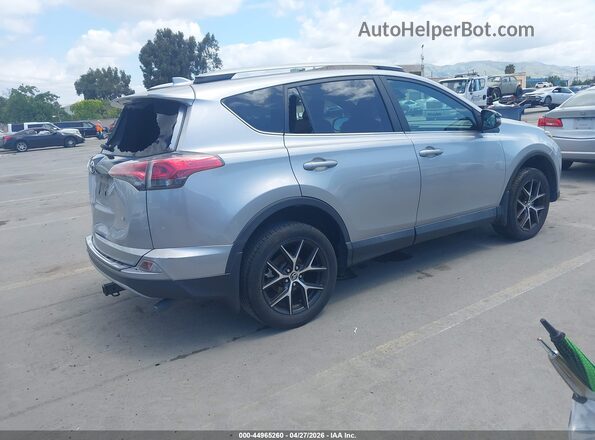 2T3NFREV1JW409473 2018 TOYOTA RAV4 Silver 
