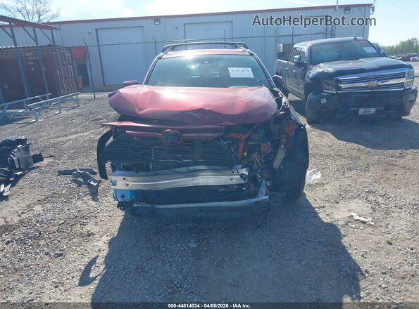 2T3R6RFV7MW014301 2021 TOYOTA LE Red Vista interior trasera